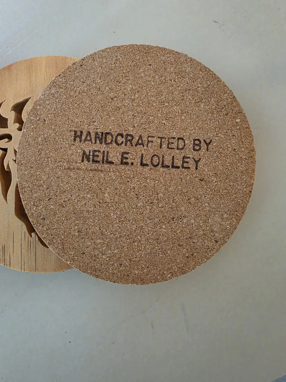 Four Wooden drink coaster set Intricate, stylized bison/buffalo head silhouette